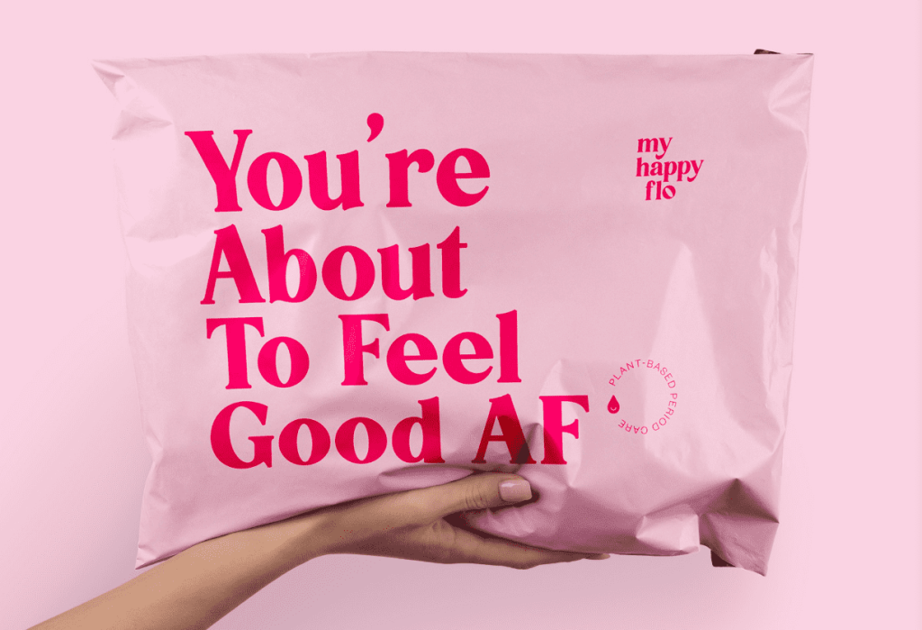 Print marketing materials: pink mailer featuring hot pink text