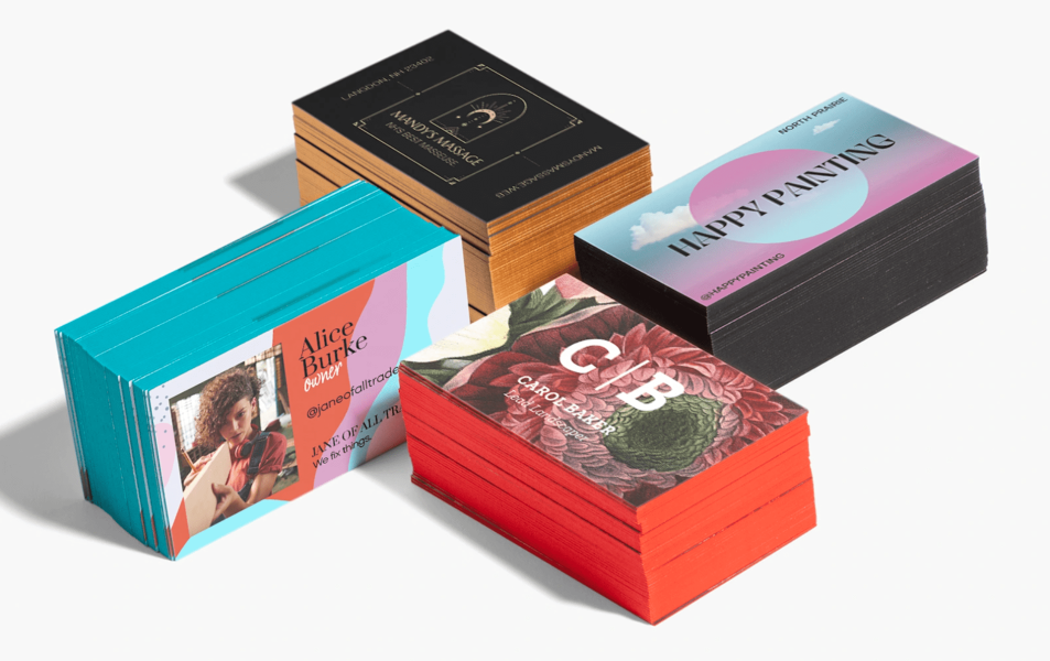 Painted edge business cards with red, black, blue and gold painted edges