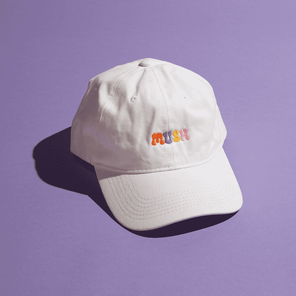 Branded white cap with colorful embroidered logo