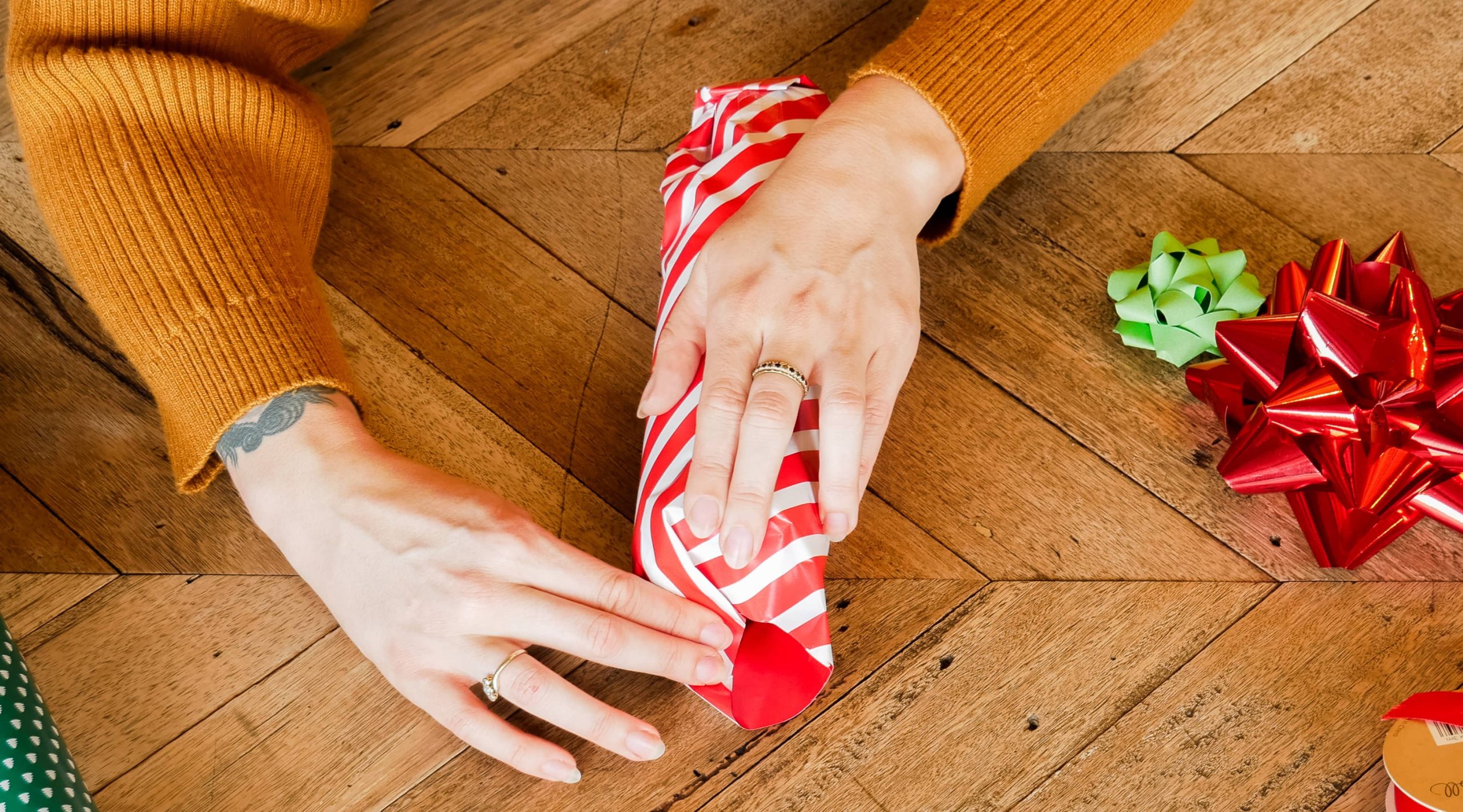 Fold over one side of the top and work your way around folding at an angle