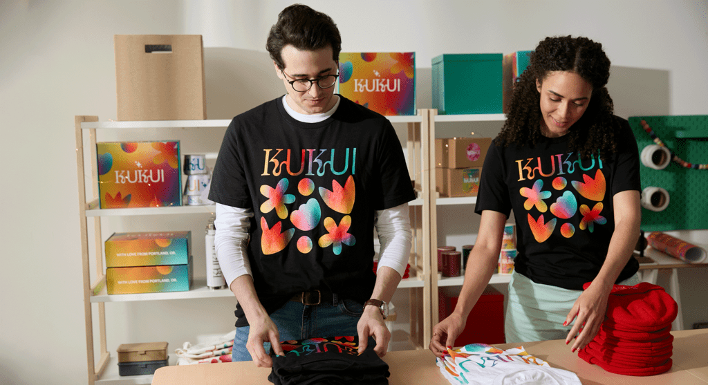 branded black T-shirt with a vibrant colorful design