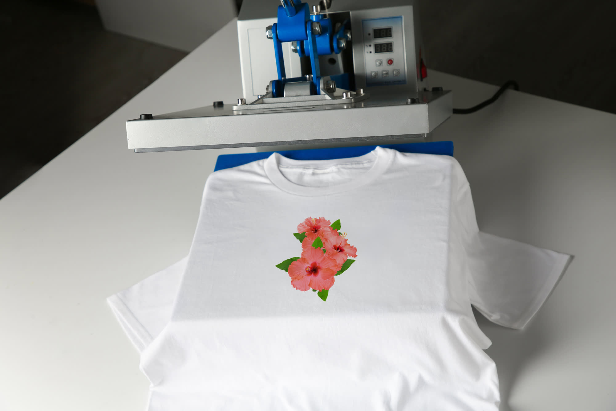 Hibiscus flowers design printed onto a custom T-shirt using a heat press