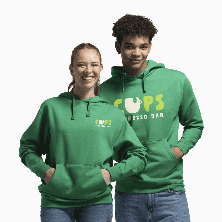 Man and woman wearing green hoodies with espresso bar logo