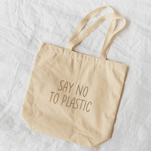 An eco-friendly tote bag design idea that says: &ldquo;Say no to plastic.&rdquo;