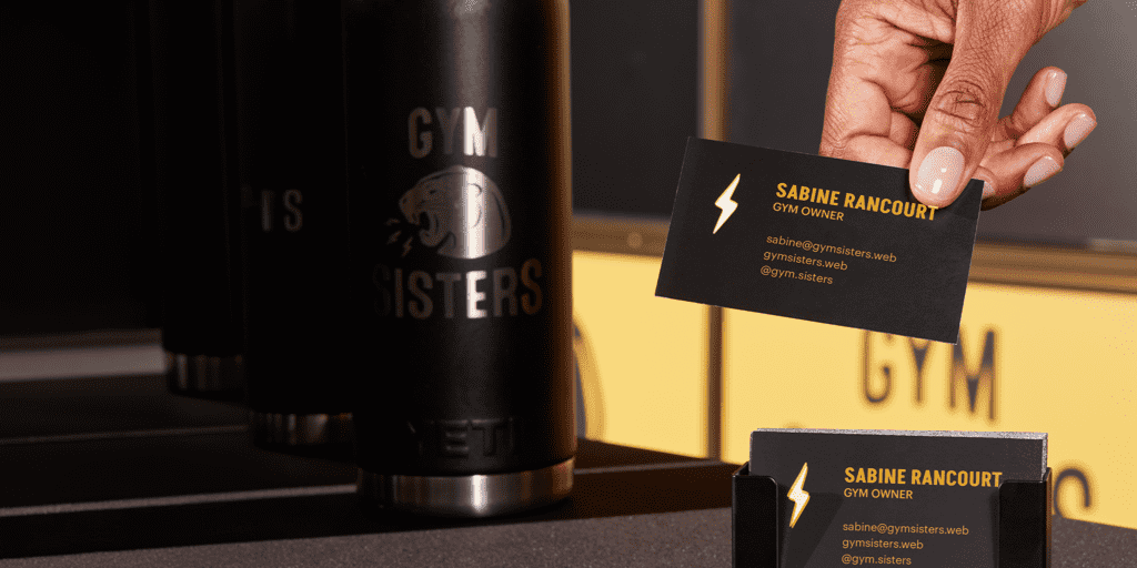 Gym owner business card with foil finish.