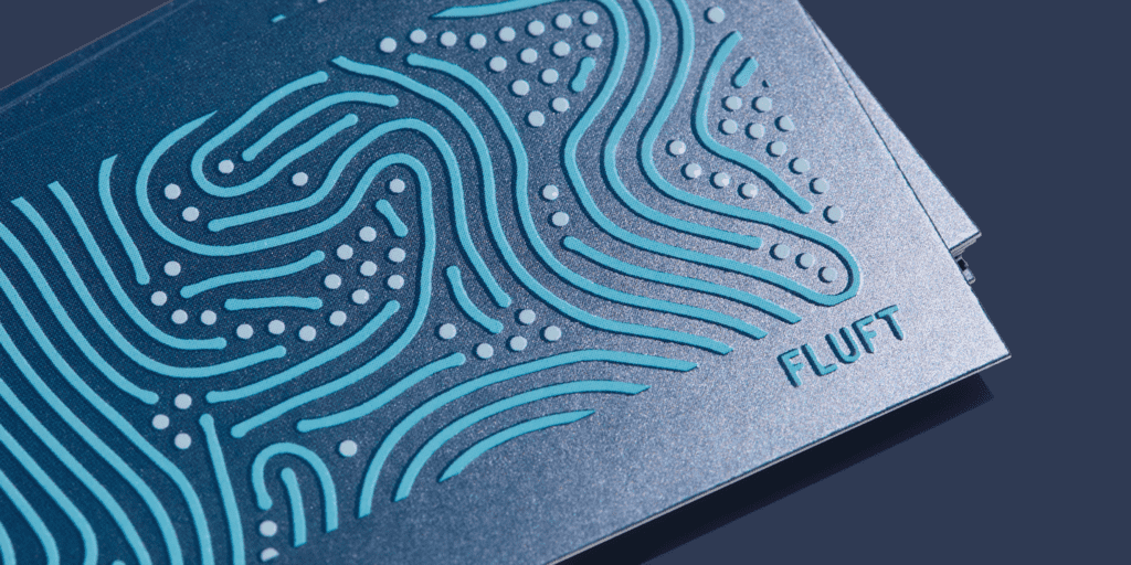 Special embossed finish on business card design.