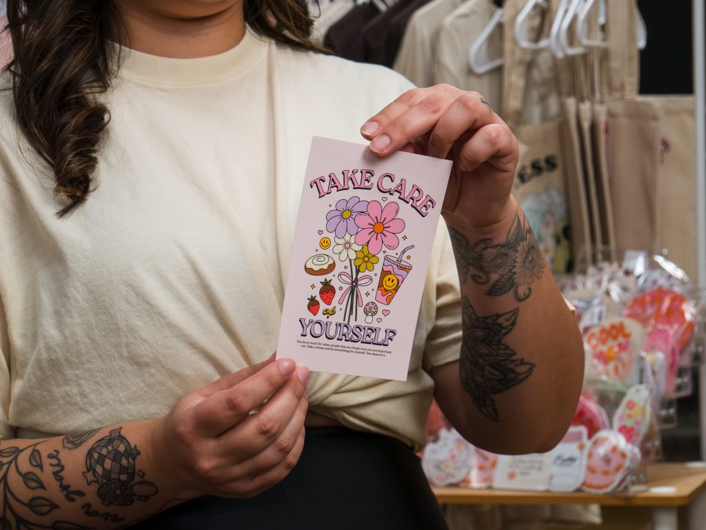 Woman with business flyer.