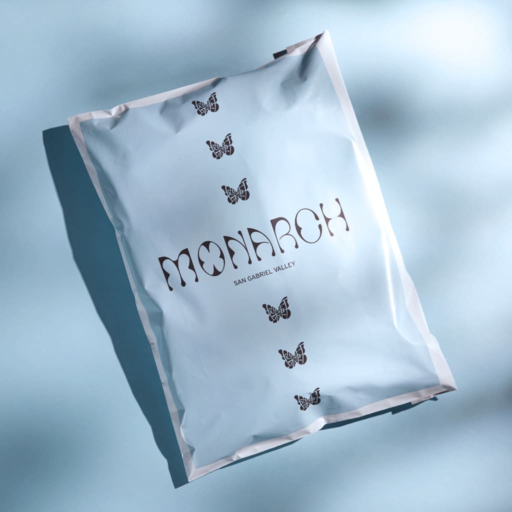 Branded packaging that features a business logo and name