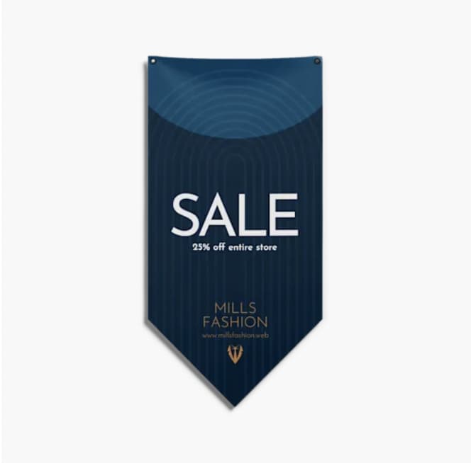 Dark-blue pennant banner advertising a sale hanging up on white wall