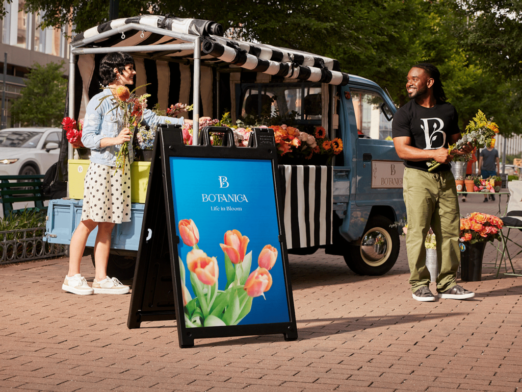 25" x 45" A-frame sign in front of a flower truck.
