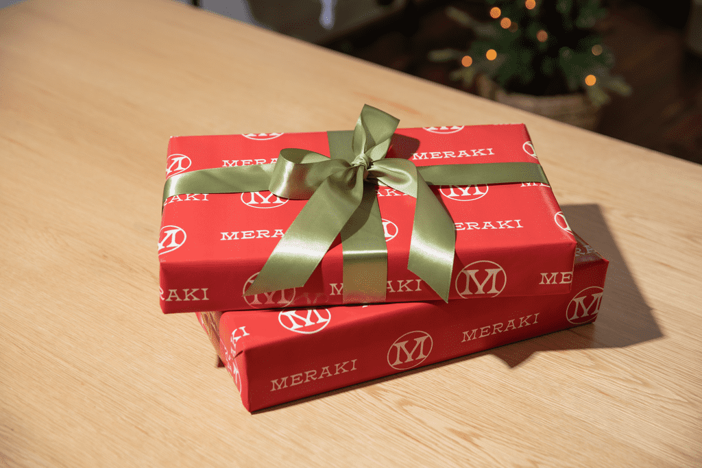 Branded holiday packaging with ribbon