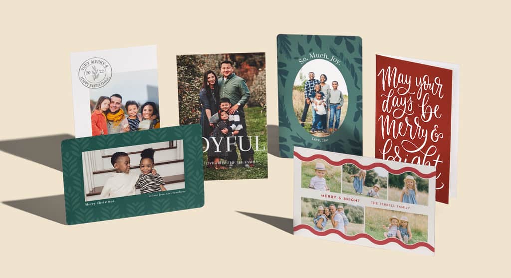A selection of festive holiday postcards and greeting cards with various symbols and colors to accommodate your celebration