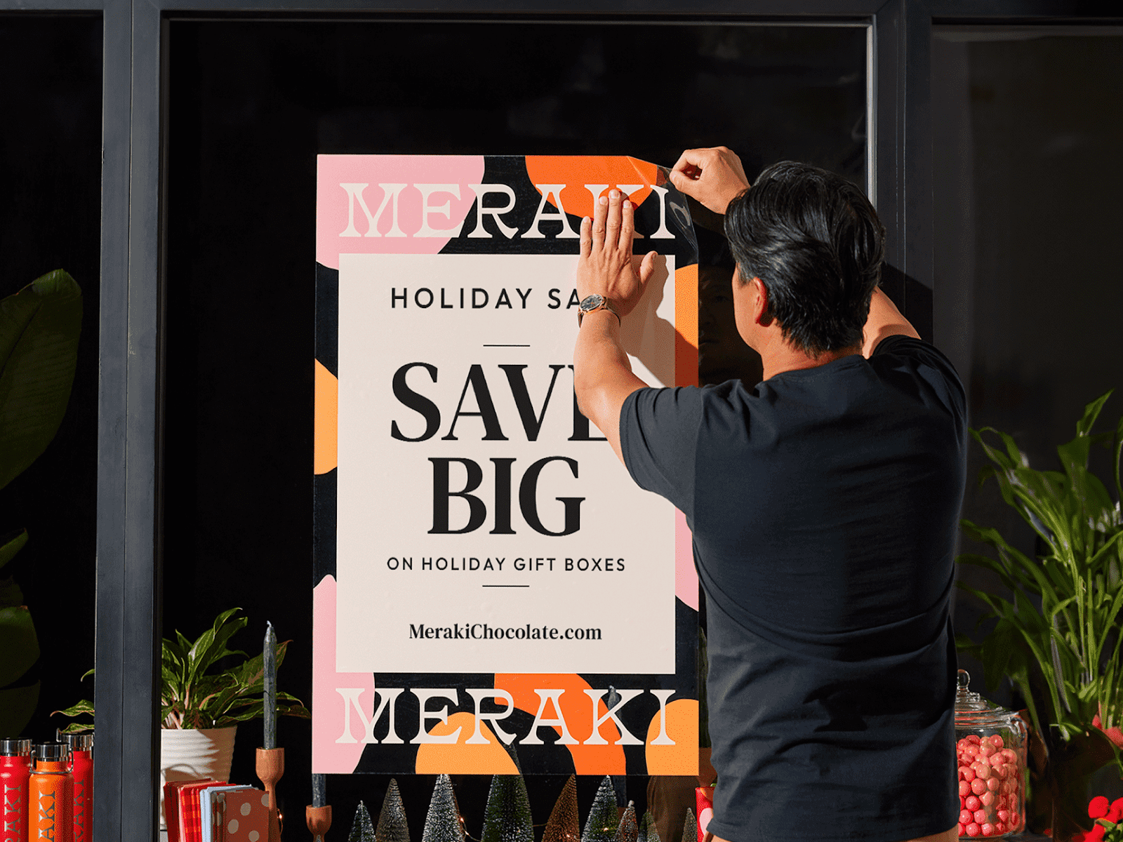 Holiday window decal poster communicating a holiday sale