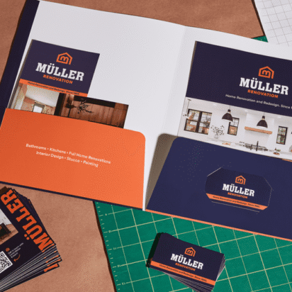 Assorted printed marketing materials in a folder