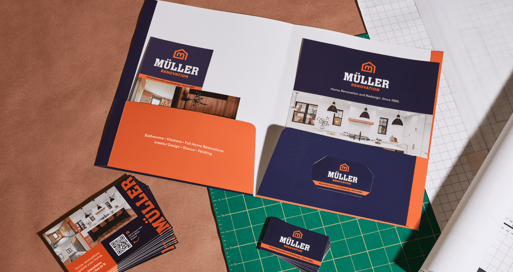 Assorted printed marketing materials in a folder