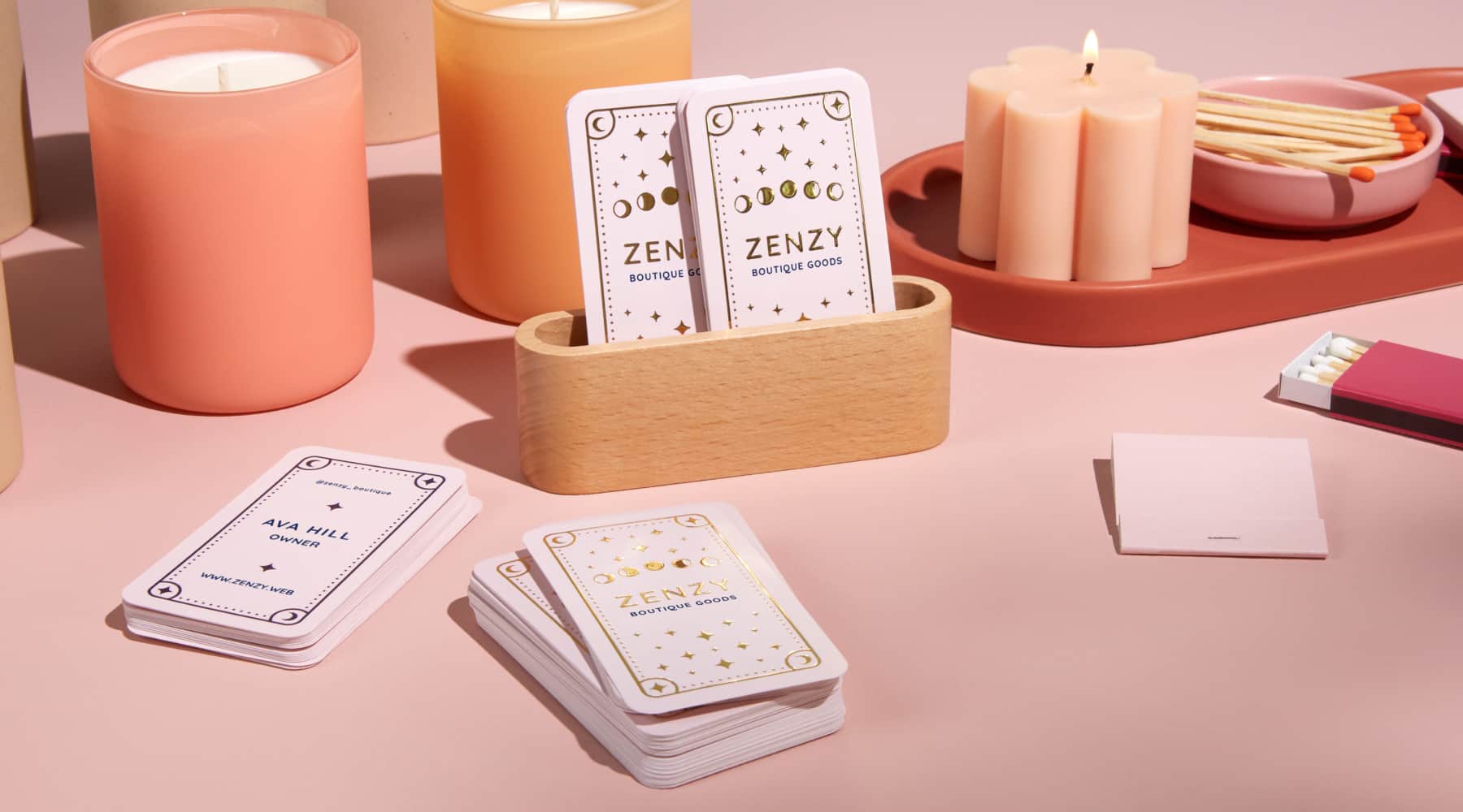 Metallic accent business cards with rounded corners for a boutique brand