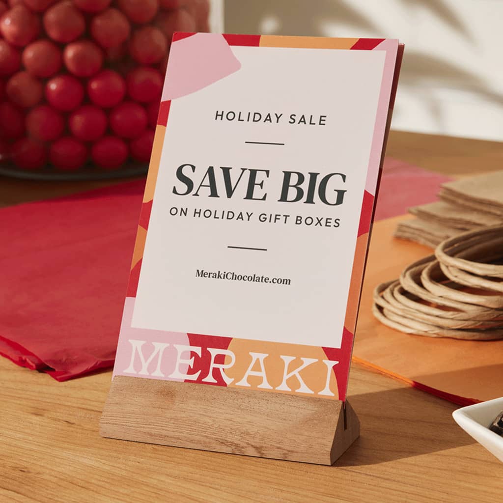 A branded holiday marketing flyer promoting a sale