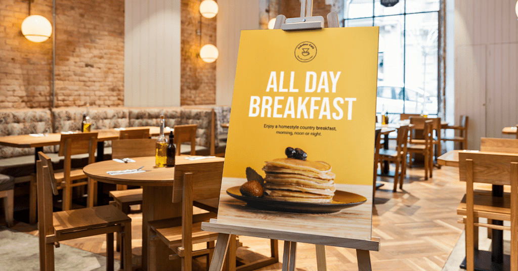 Signage with clear typography announcing &ldquo;All Day Breakfast&rdquo;