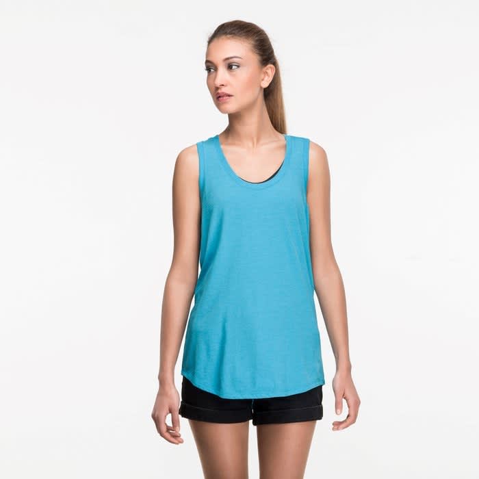A woman wearing a blue athletic scoop neck tank top