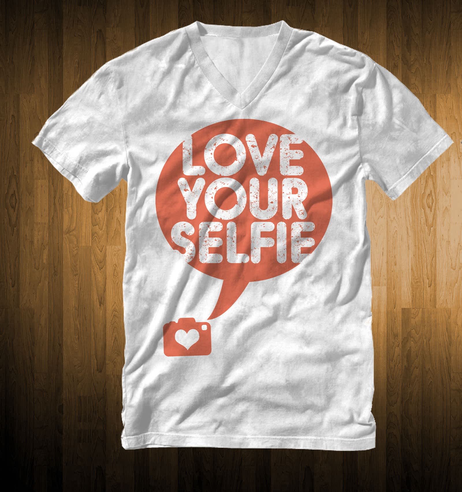 A custom white T-shirt with a V-neck T-shirt neckline and a large orange design “Love your selfie”