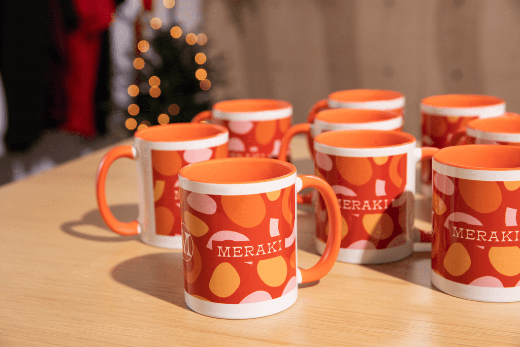 Branded festive mugs in red and orange