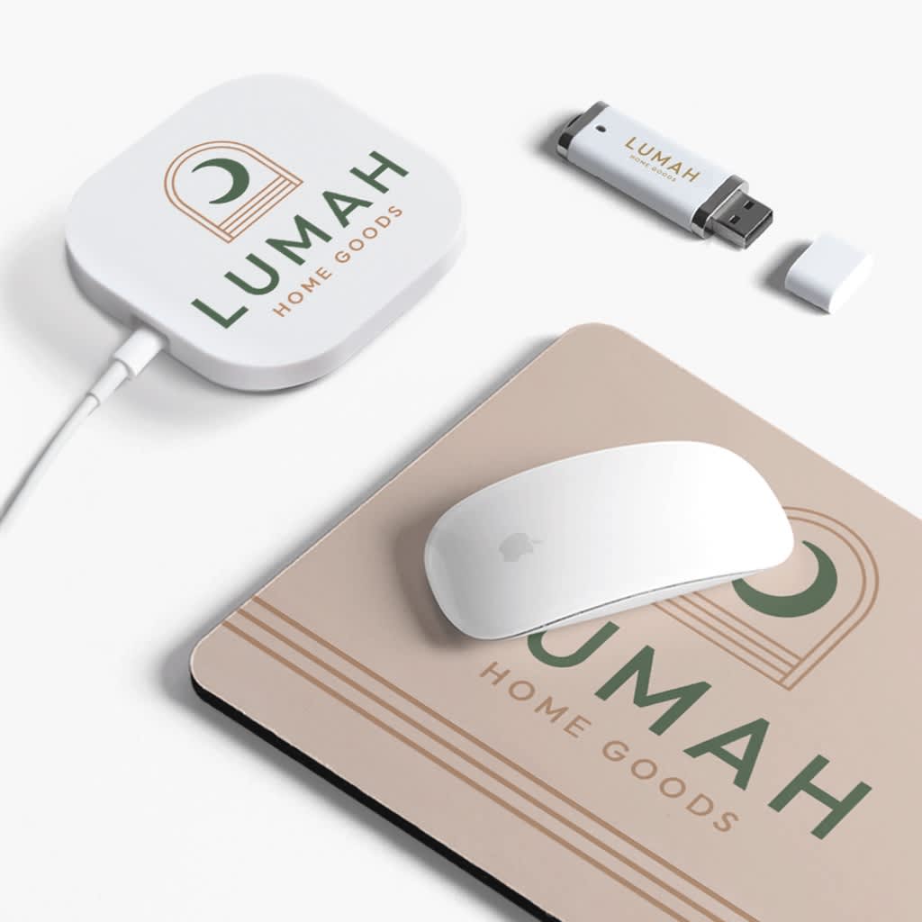 Selection of branded &ldquo;Lumah&rdquo; desk accessories, including a mouse pad, USB storage, and portable charger.