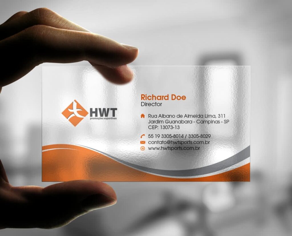 Clear business card with slight texture features bold orange and grey accents.