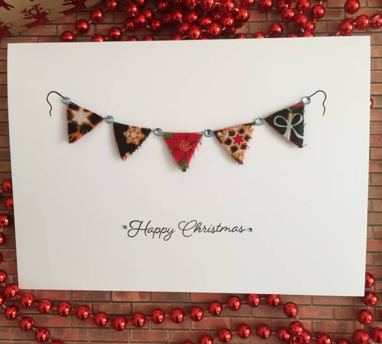 DIY Christmas card design made with fabric scraps